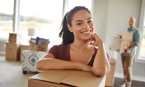 Couple moving in after obtaining their real-estate loan